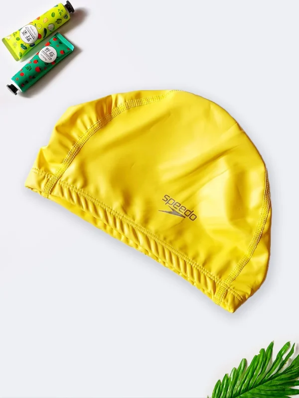 کلاه استخر شنا زنانه و مردانه چرمی با جنس فومی زرد رنگ طرح ساده مارک اسپیدو ( Speedo )