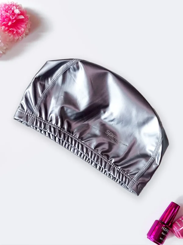 کلاه شنا زنانه چرمی و فومی طرح ساده مارک اسپیدو ( Speedo ) طوسی رنگ