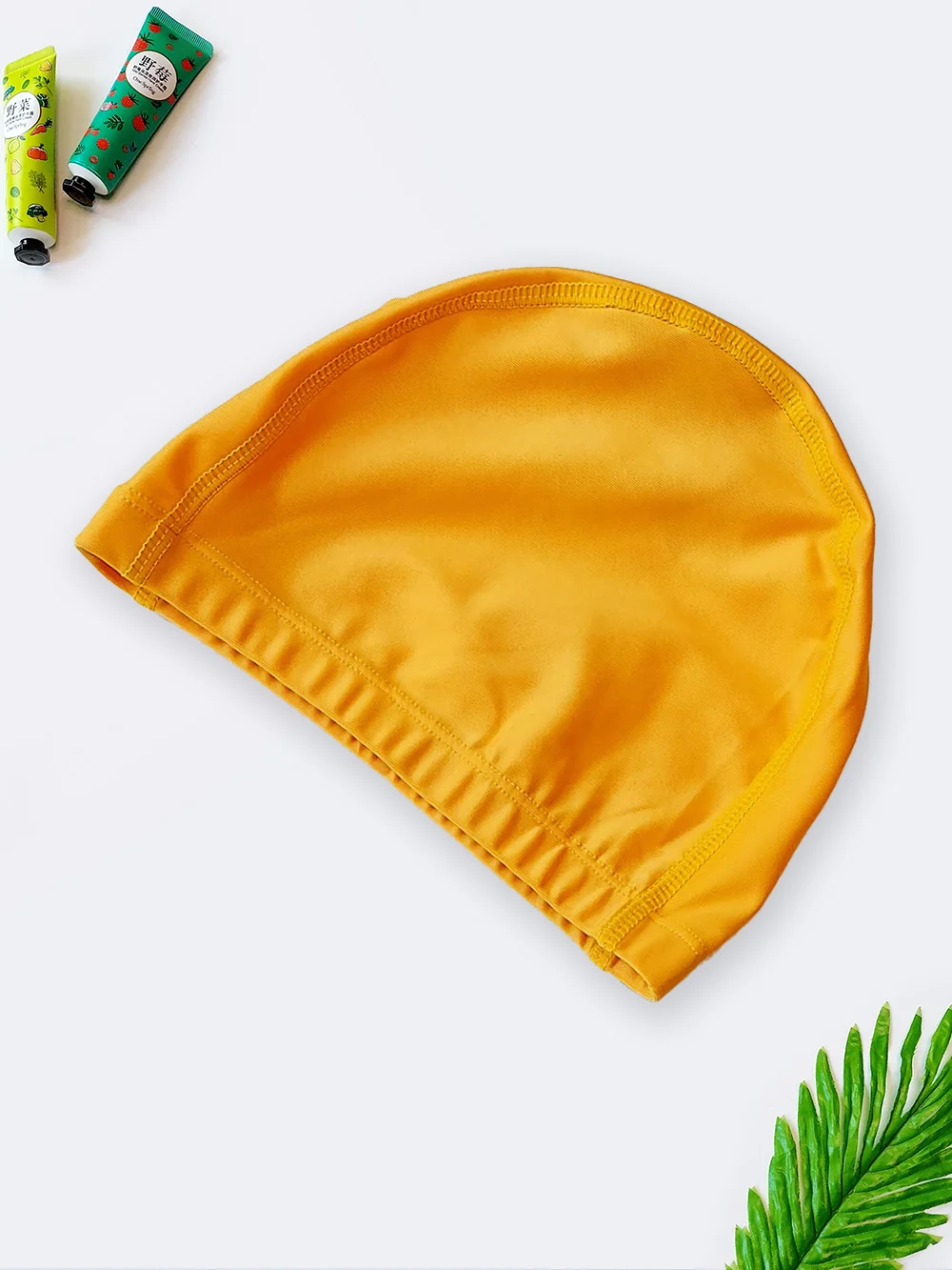 Cap3700114-1 کلاه شنا زنانه و دخترانه بچگانه زرد طلایی رنگ شیک و خاص با جنس پارچه ضد کلر